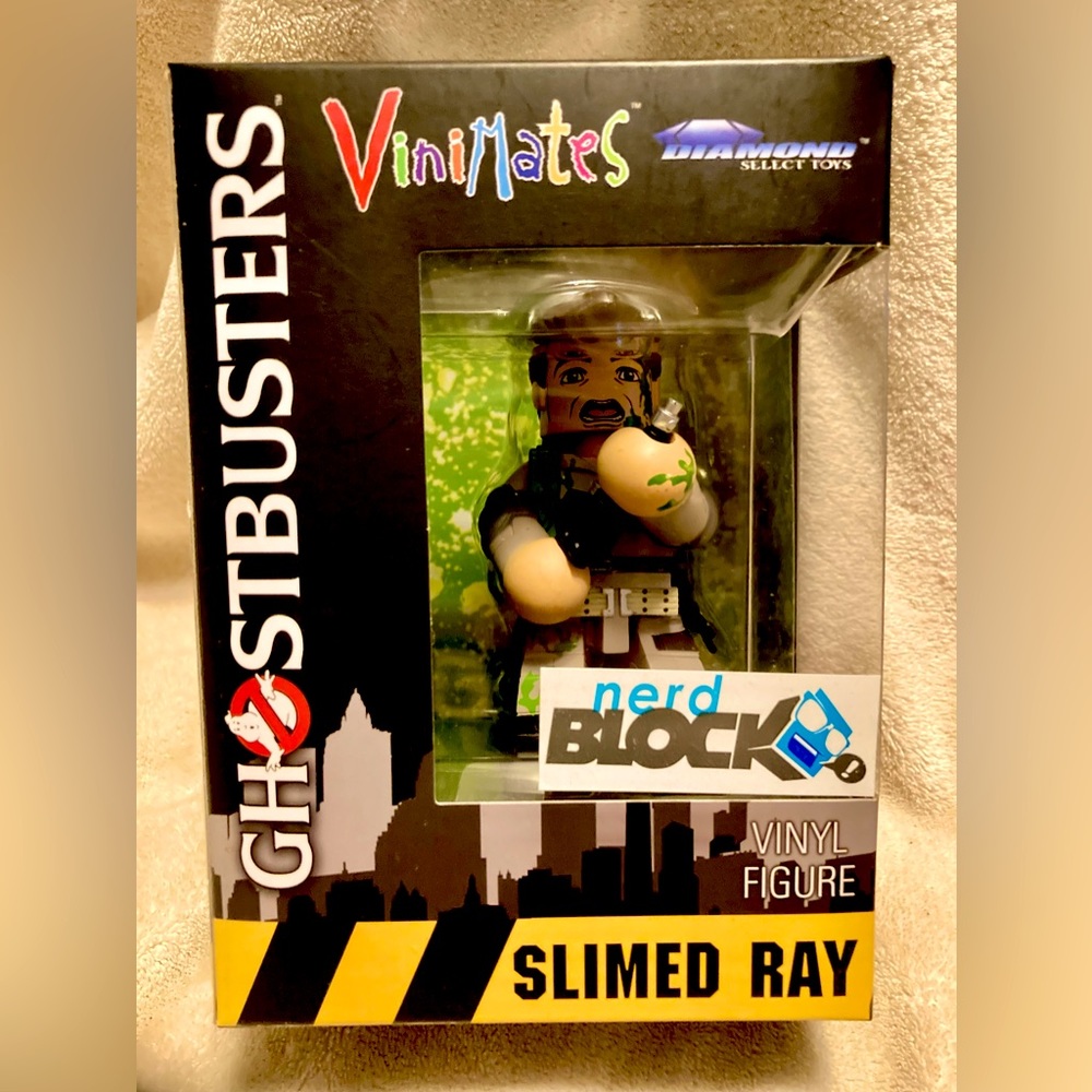 Nerd Block Exclusive!  Vinimates Ghostbusters ‘Slimed Ray’ Vinyl Figure